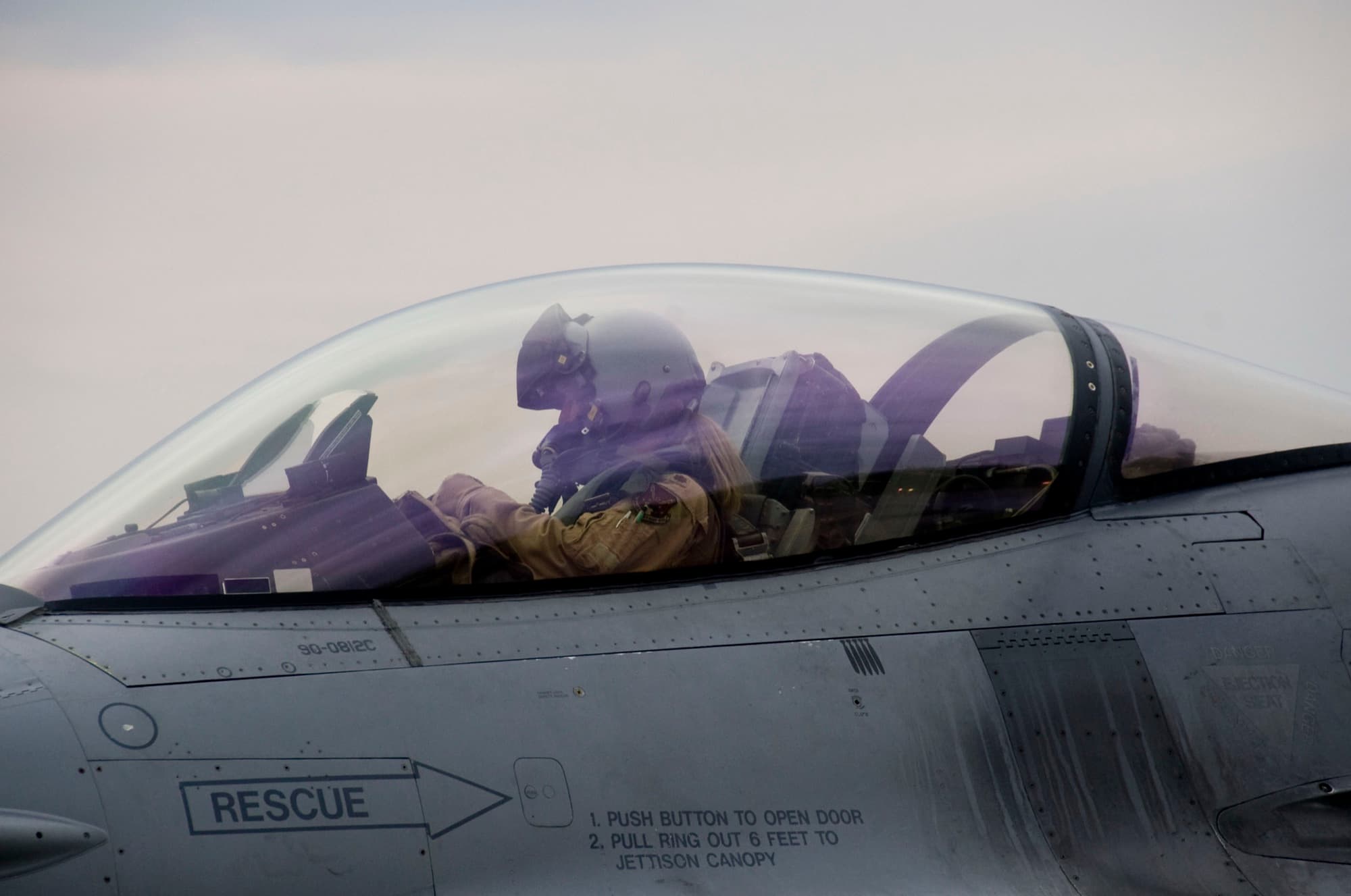 A female F-16 pilot in the cockpit at Misawa Air Base, Japan
