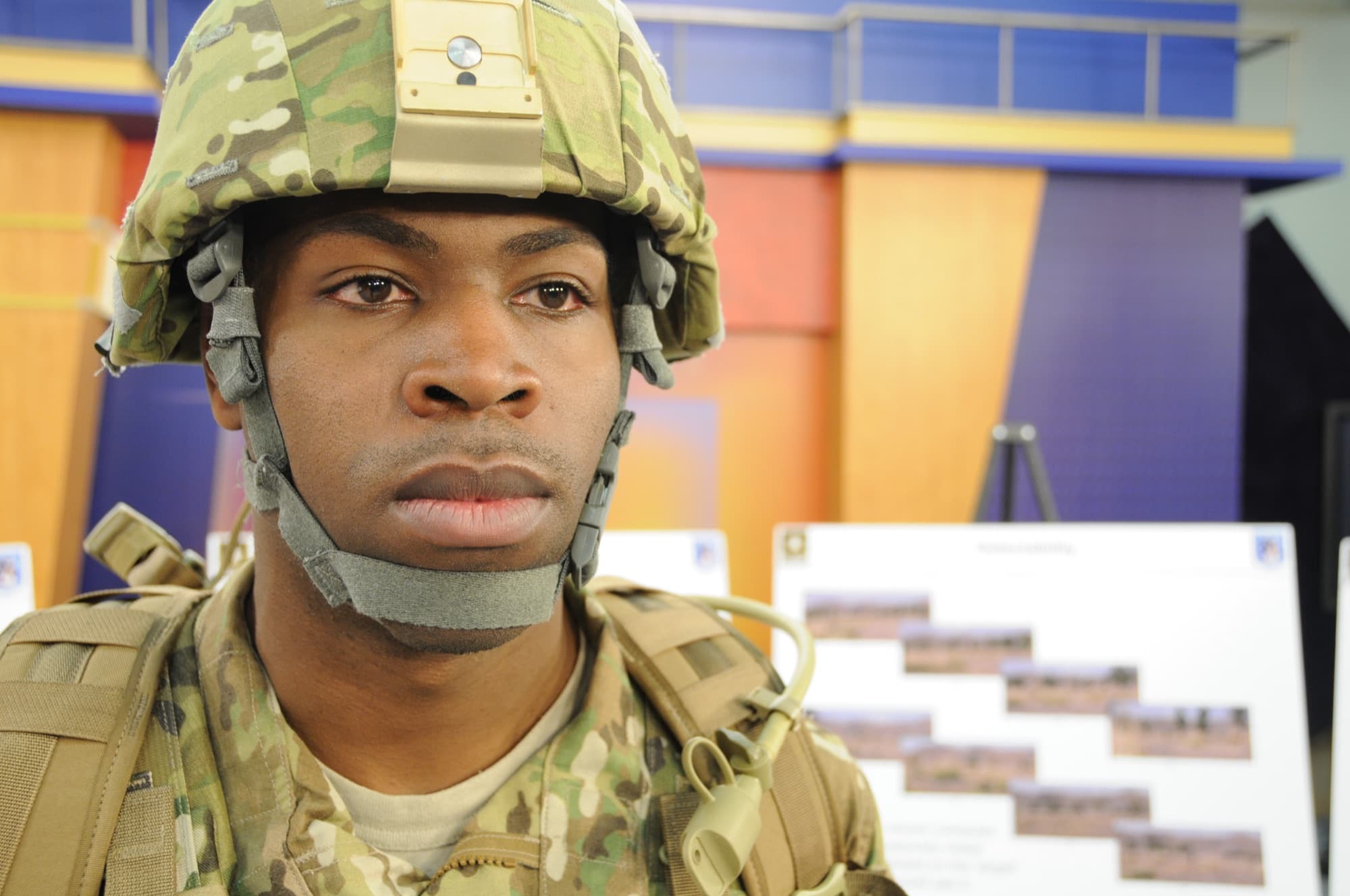 A Black Army soldier in a combat uniform and helmet