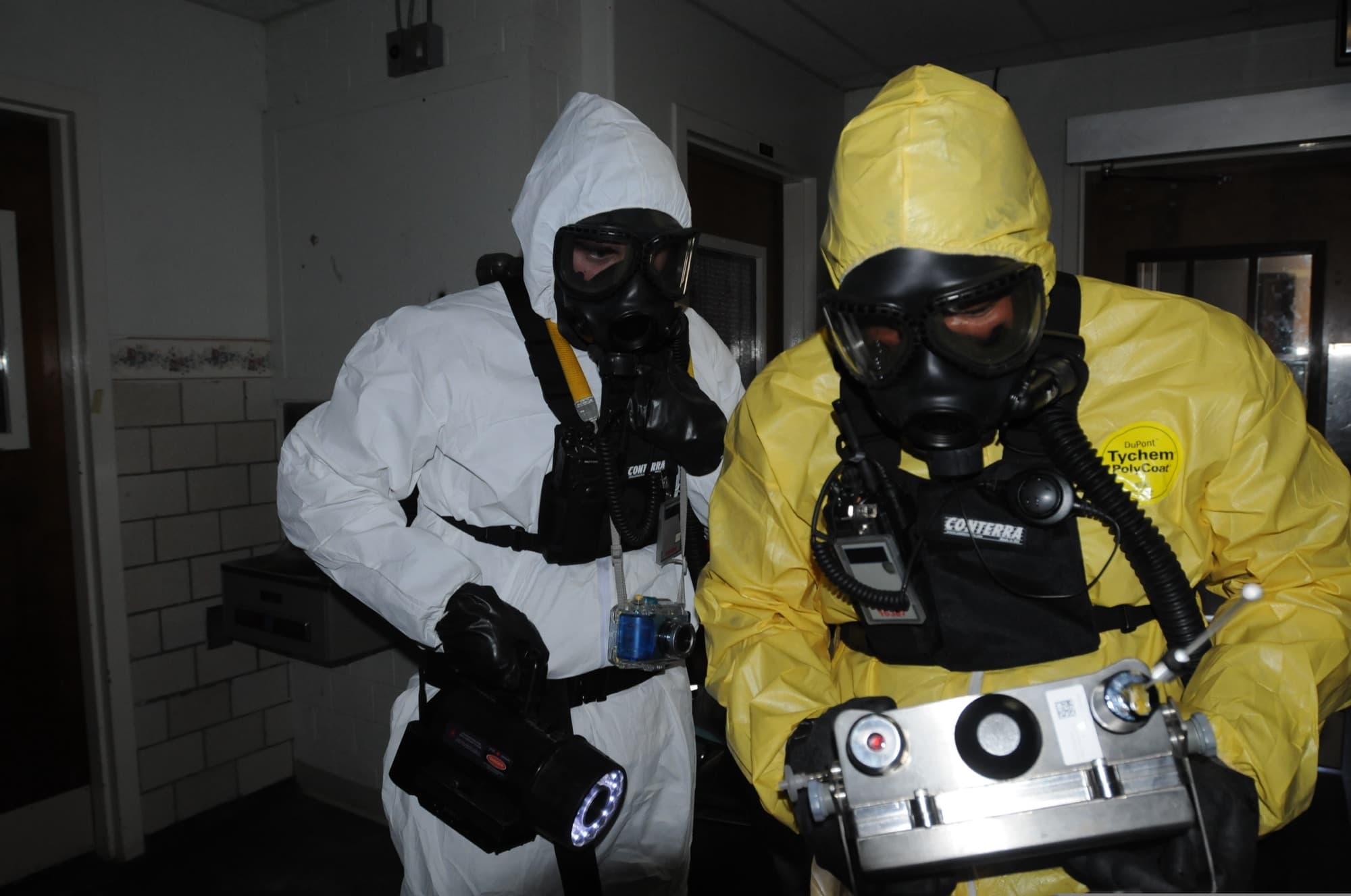 U.S. Army CBRN specialists checking detection equipment during training
