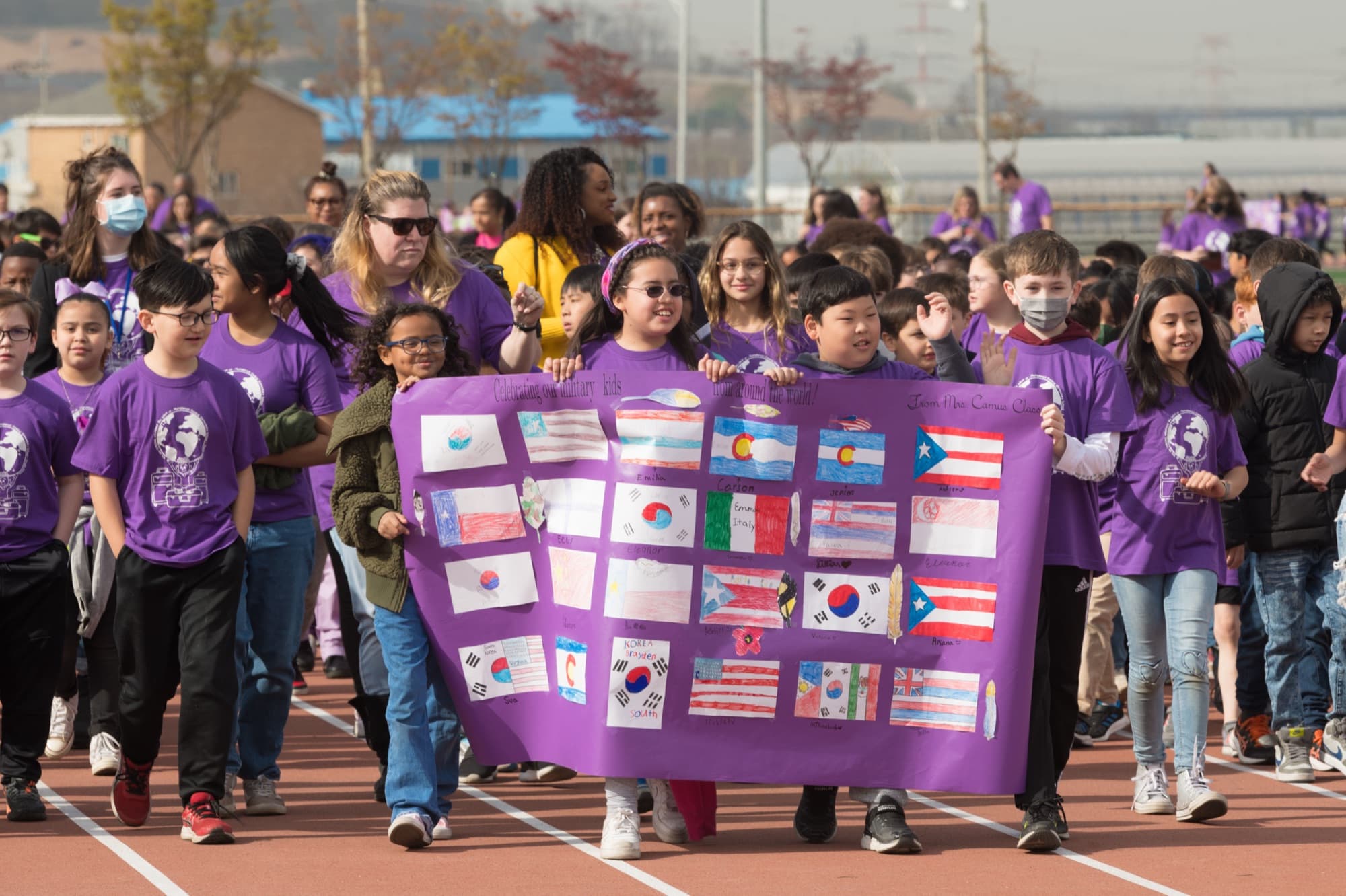 Military children in civilian clothes celebrating Month of the Military Child
