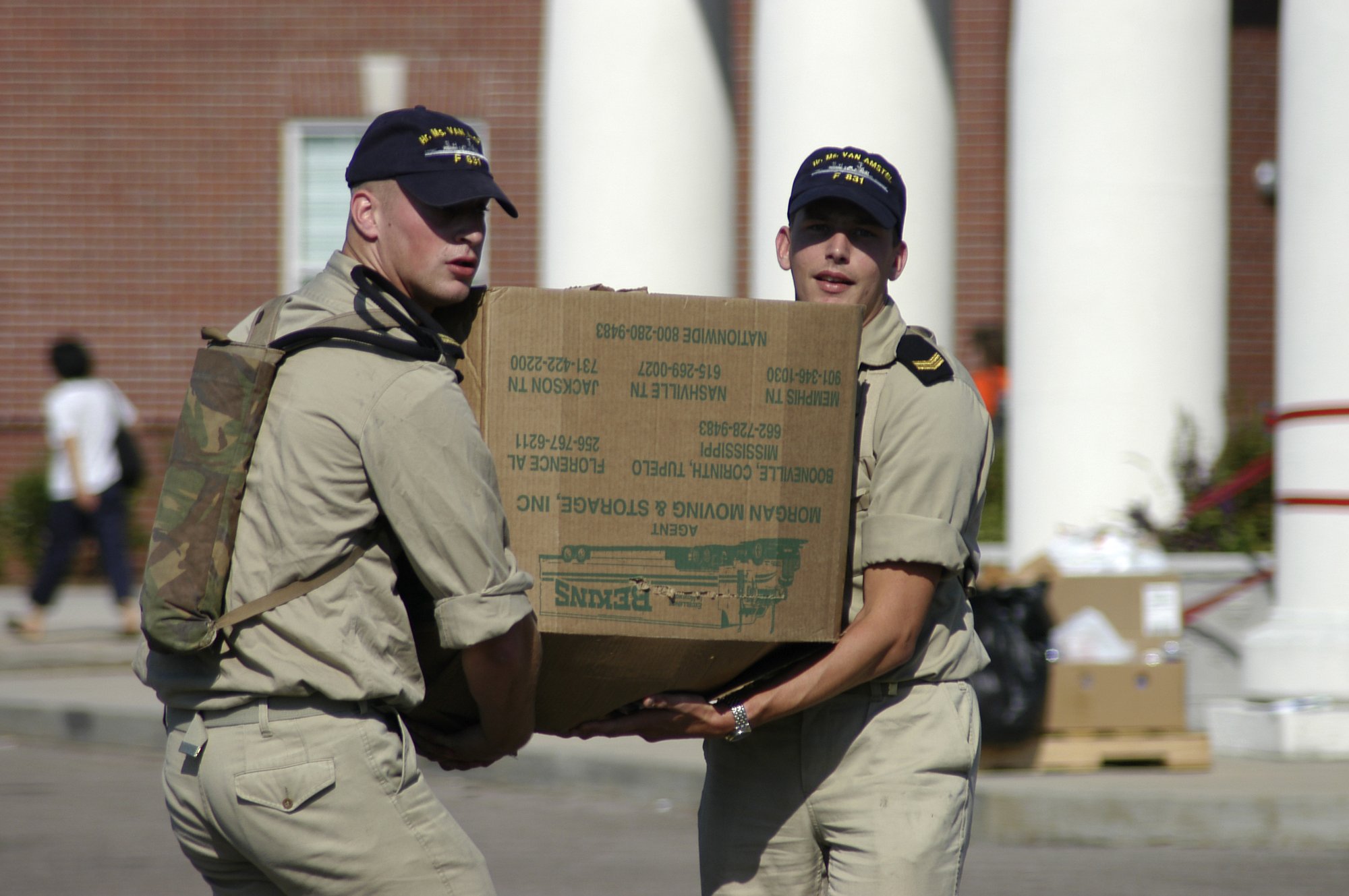 Service members load household goods during a PCS